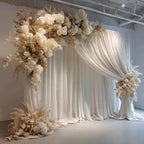 Elegant Ivory Drapes & Floral Statement Backdrop