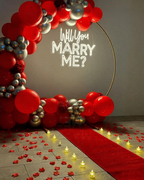 Red & Silver Balloon Ring Proposal Setup with Neon Sign
