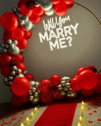 Red & Silver Balloon Ring Proposal Setup with Neon Sign